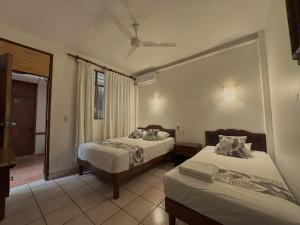 Giường trong phòng chung tại Hotel San Juan +107 ảnh