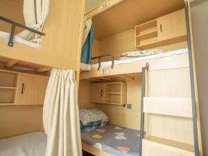 Fotografie z fotogalerie ubytování Yiweidu Youth Apartment v destinaci Šen-čen + 34 fotografií