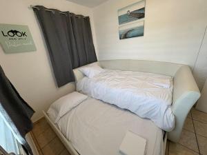 Postel nebo postele na pokoji v ubytování Casa playera