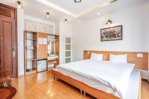 Postel nebo postele na pokoji v ubytování Thanh Anh 2 Hotel - Gần Chợ Đêm Đà Lạt