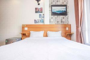 Postel nebo postele na pokoji v ubytování Thanh Anh 2 Hotel - Gần Chợ Đêm Đà Lạt