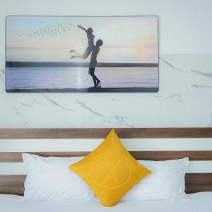 Postel nebo postele na pokoji v ubytování Khách Sạn Thanh Xuân