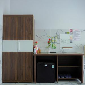 Kuchyň nebo kuchyňský kout v ubytování Khách Sạn Thanh Xuân