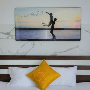 Postel nebo postele na pokoji v ubytování Khách Sạn Thanh Xuân