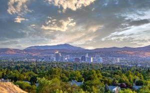 a view of a city with trees and buildings at Amazing Water View with Jacuzzi & Sky Lounge in Sparks