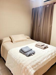 Ένα ή περισσότερα κρεβάτια σε δωμάτιο στο Departamento ISABELLA