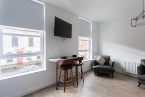 TV a/nebo společenská místnost v ubytování Belfast Boutique Apartment for 2