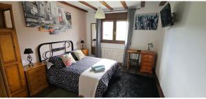 Postel nebo postele na pokoji v ubytování Vivienda María Lourdes