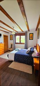 Postel nebo postele na pokoji v ubytování Vivienda María Lourdes
