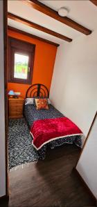 Postel nebo postele na pokoji v ubytování Vivienda María Lourdes