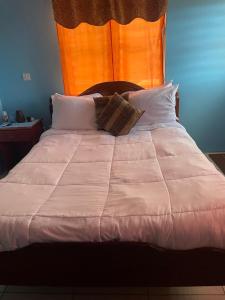 Voodi või voodid majutusasutuse Seaview Guesthouse Apt #2 toas