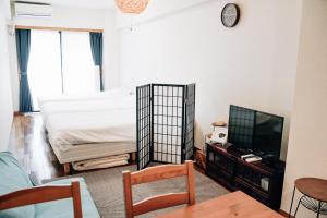 TV a/nebo společenská místnost v ubytování Tipy records inn room