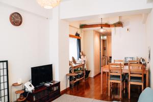 TV a/nebo společenská místnost v ubytování Tipy records inn room