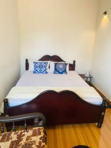 Postel nebo postele na pokoji v ubytování MK Guest House