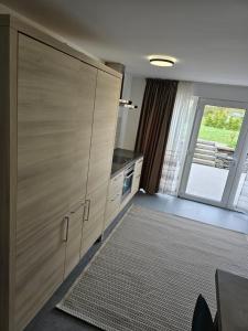 Kuchyň nebo kuchyňský kout v ubytování Gribomont Loft