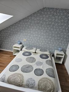 Postel nebo postele na pokoji v ubytování Gribomont Loft