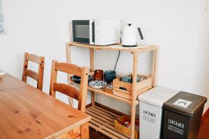 Kuchyň nebo kuchyňský kout v ubytování Tipy records inn room