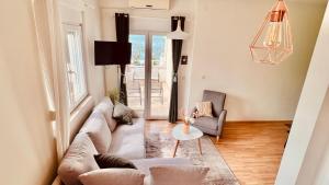 Posezení v ubytování Luxury Beach Apartment w Sunset Sea Views