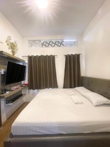 Katil atau katil-katil dalam bilik di Pawchie Diamond Transient House