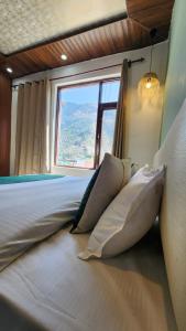 Ліжко або ліжка в номері Hotel Mahadev