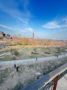a group of people walking in a park at Star Palace in Diyarbakır