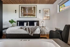 Postel nebo postele na pokoji v ubytování Istana Bliss - Formerly Kudos Bliss