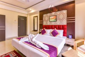 Mount Amara Hotel & Spa, Siliguri客房内的一张或多张床位