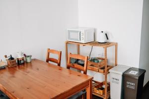Kuchyň nebo kuchyňský kout v ubytování Tipy records inn room