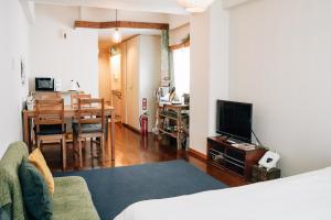 TV a/nebo společenská místnost v ubytování Tipy records inn room