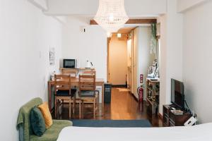 TV a/nebo společenská místnost v ubytování Tipy records inn room