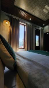 Ліжко або ліжка в номері Hotel Mahadev