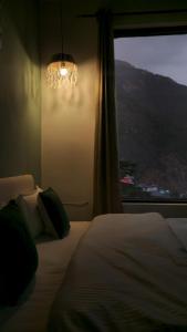 Ліжко або ліжка в номері Hotel Mahadev