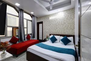 Postel nebo postele na pokoji v ubytování Hotel Nancy Dx Near New Delhi Railway Station