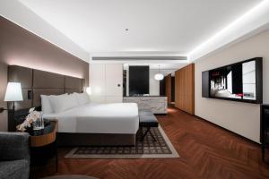 En eller flere senger på et rom på Intercity Hotel Hangzhou West Lake Wulin Plaza