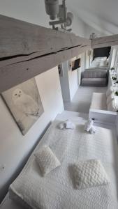 Posteľ alebo postele v izbe v ubytovaní Apartament White R parking w cenie!!!