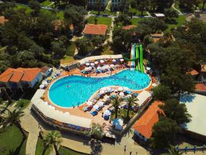 an overhead view of a swimming pool at a resort at Club Resort Atlantis in Seferihisar