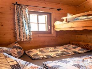 Posteľ alebo postele v izbe v ubytovaní Rustic Hut Salzburg near Ski Slopes