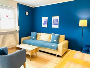 Posezení v ubytování Kleine Auszeit Ferienwohnung nahe Bosenbergklinik mit Parkplatz, Haustiere willkommen