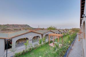 A garden outside Villa Euphoria Resort at Statue of Unity