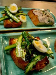 two plates of food with broccoli and eggs on toast at Locanda dei pescatori in Domaso +31 photos