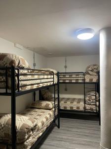 Postel nebo postele na pokoji v ubytování Rahman Hostel