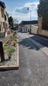 an empty street with a street light on the side at Appartement Rethel - Netflix - Marc & cécile in Rethel