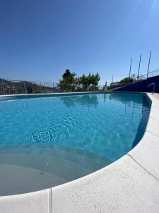 Bazén v ubytovaní Residence Hotel Edy alebo v jeho blízkosti