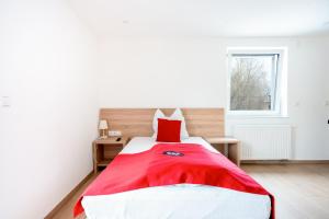 Postel nebo postele na pokoji v ubytování B&S Hotel