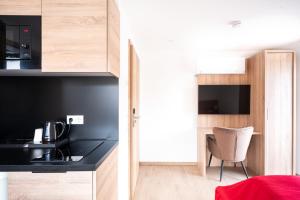 Kuchyň nebo kuchyňský kout v ubytování B&S Hotel