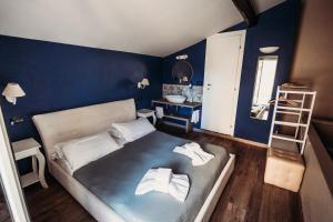 Postel nebo postele na pokoji v ubytování Hotel Domus Tiberina