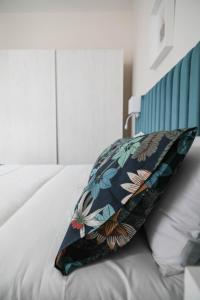Postel nebo postele na pokoji v ubytování B&B Guida