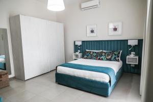 Postel nebo postele na pokoji v ubytování B&B Guida