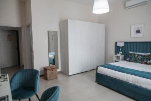 Postel nebo postele na pokoji v ubytování B&B Guida