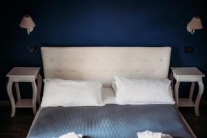 Postel nebo postele na pokoji v ubytování Hotel Domus Tiberina